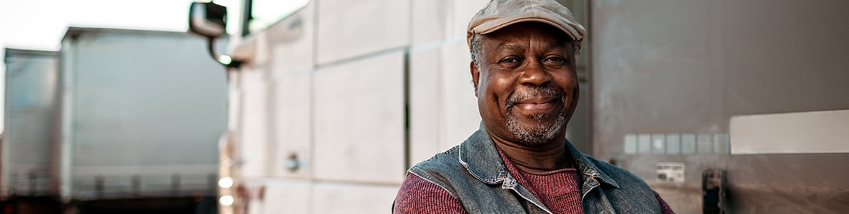 A smiling truckdriver.