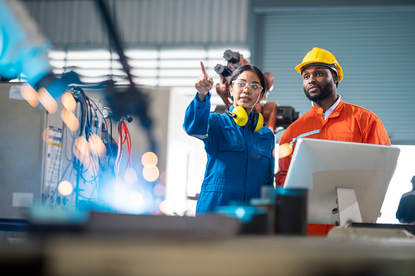 Professionals in manufacturing at work.
