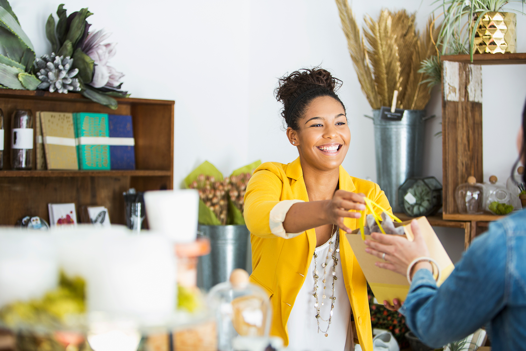 Smiling woman who starts a small business