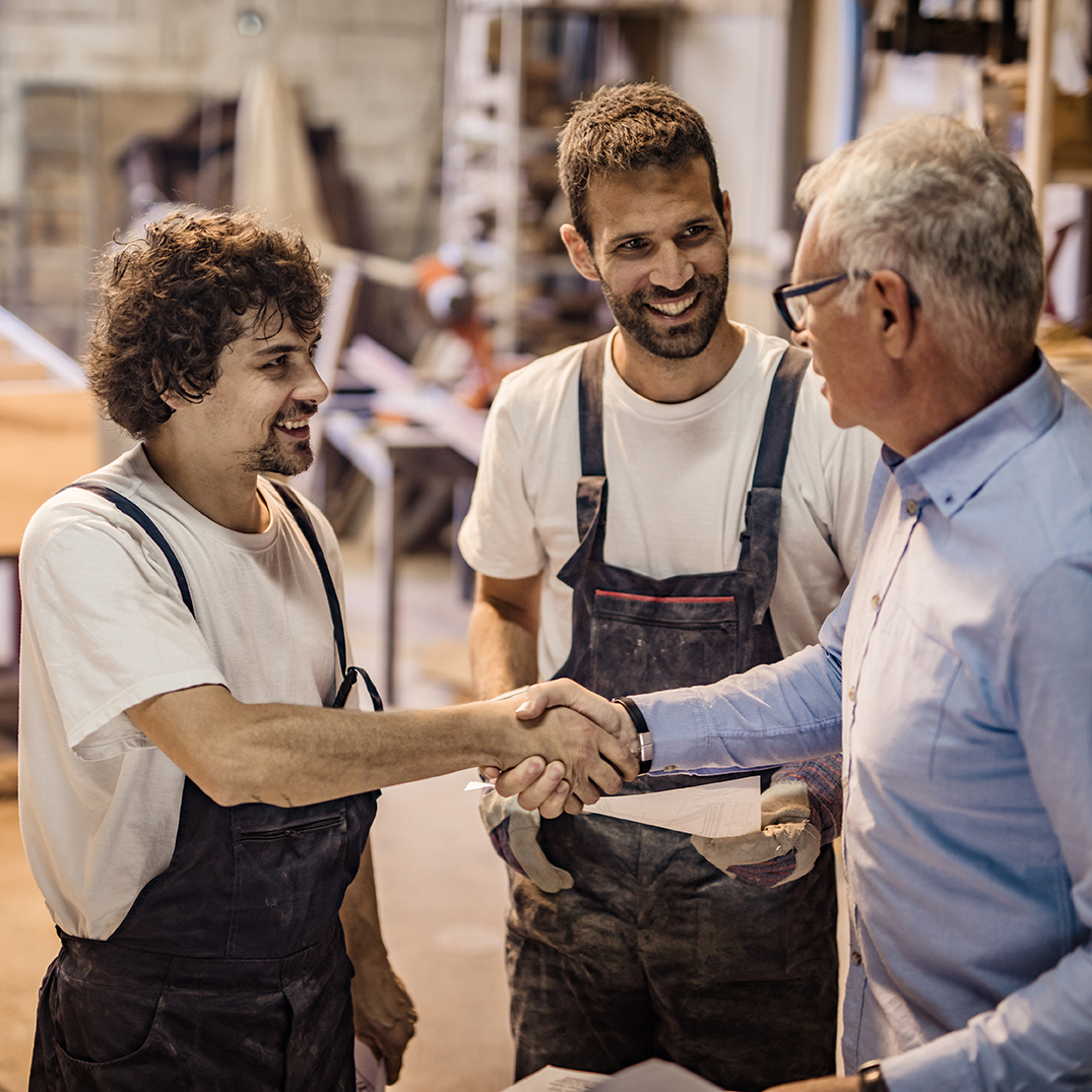 Two men handshaking during a business networking